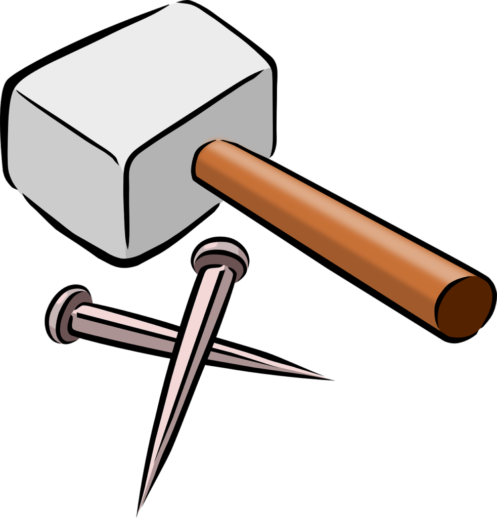 An image of a hammer and two nails.